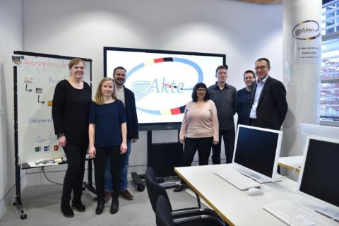 Das Projektteam (7 Personen) in einem Büro des BMJV
